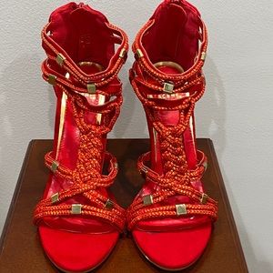 Scene Kandi red woven rope heeled sandals.
